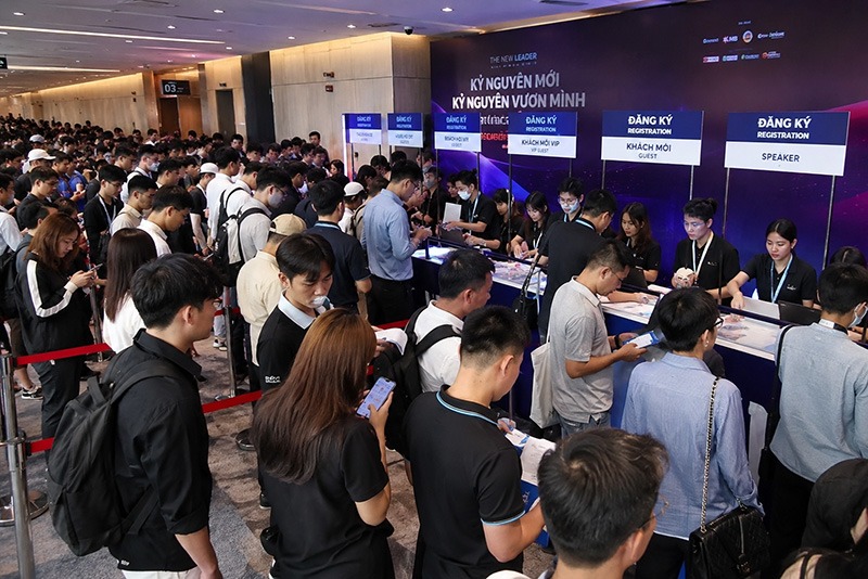 Hundreds arrive at once and the check-in gate jams solid